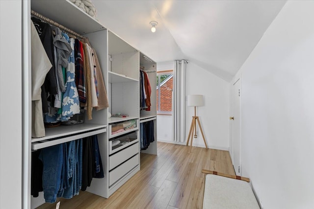 21111 Fleetwood Dr, Harper Woods, MI 48225 - spacious closet featuring light wood finished floors and lofted ceiling