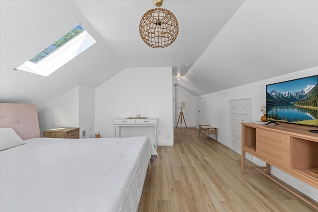 21111 Fleetwood Dr, Harper Woods, MI 48225 - bedroom featuring a skylight, wood finished floors, and vaulted ceiling
