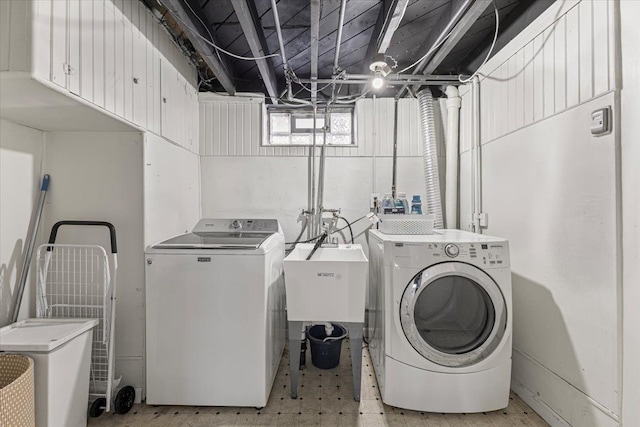 21111 Fleetwood Dr, Harper Woods, MI 48225 - laundry room featuring independent washer and dryer and cabinet space