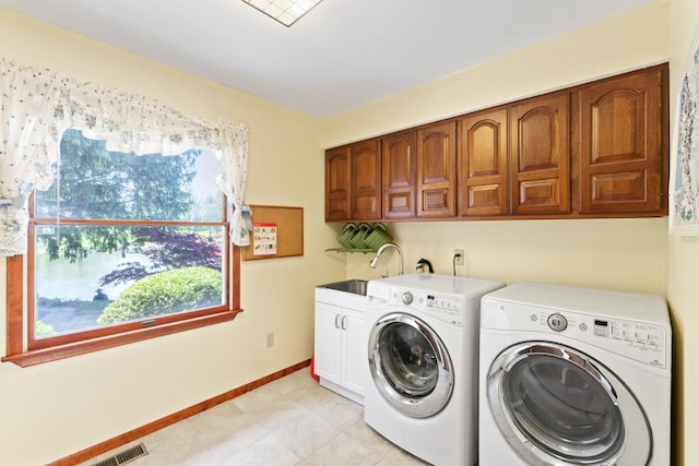 7500 Ore Knob Ct, Fenton, MI 48430 - washroom with cabinet space, independent washer and dryer, baseboards, and light tile patterned floors
