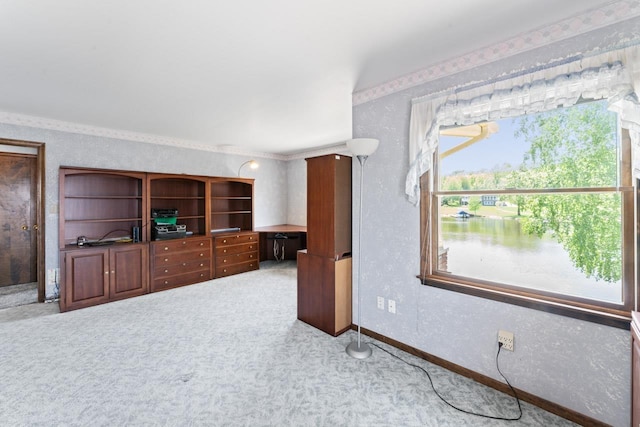 7500 Ore Knob Ct, Fenton, MI 48430 - unfurnished living room with carpet flooring, baseboards, and a desk