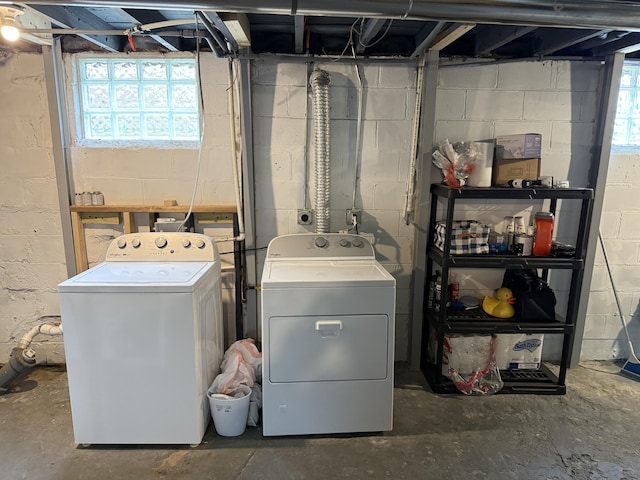 laundry area with washing machine and clothes dryer
