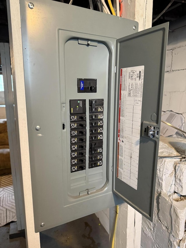 utility room featuring electric panel