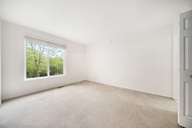 3197 Asher Rd, Ann Arbor, MI 48104 - spare room featuring light carpet and baseboards
