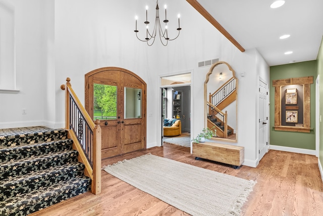 4263 Windmill Farms, Milford, MI 48380 - entrance foyer featuring stairway, wood finished floors, a chandelier, baseboards, and recessed lighting