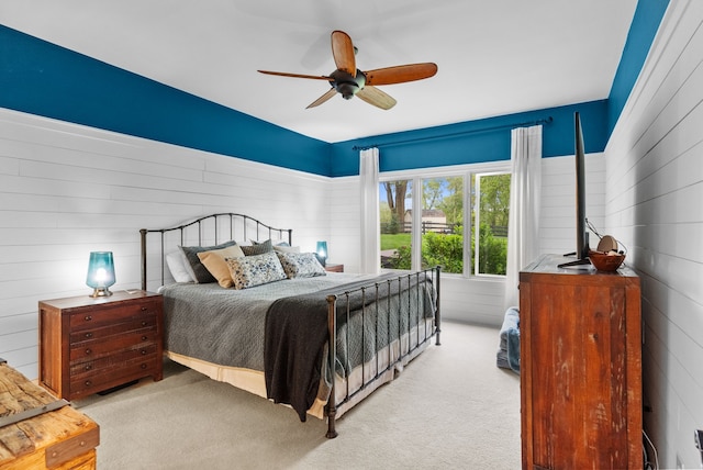 4263 Windmill Farms, Milford, MI 48380 - bedroom with wooden walls, light colored carpet, and a ceiling fan