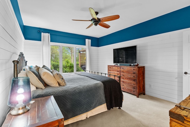4263 Windmill Farms, Milford, MI 48380 - carpeted bedroom featuring wooden walls and ceiling fan