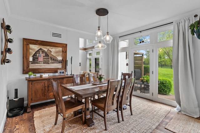 4263 Windmill Farms, Milford, MI 48380 - dining area featuring light wood-type flooring and crown molding