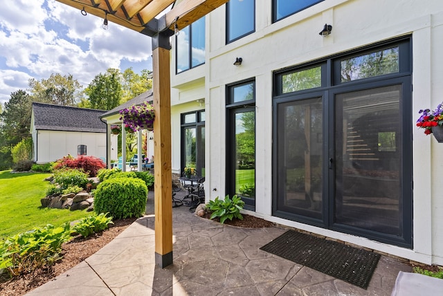 4263 Windmill Farms, Milford, MI 48380 - view of exterior entry featuring a patio area