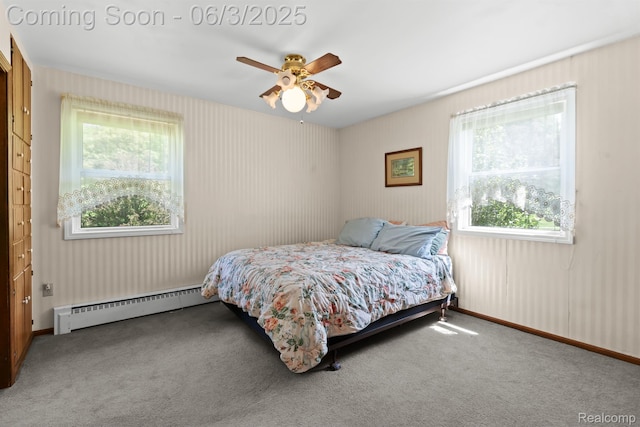 7109 Lake Shore Dr, Chelsea, MI 48118 - bedroom featuring a baseboard radiator, multiple windows, and carpet