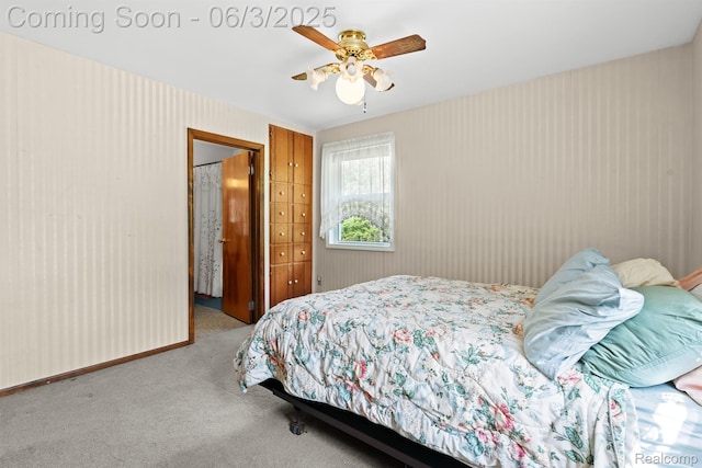 7109 Lake Shore Dr, Chelsea, MI 48118 - carpeted bedroom featuring a ceiling fan