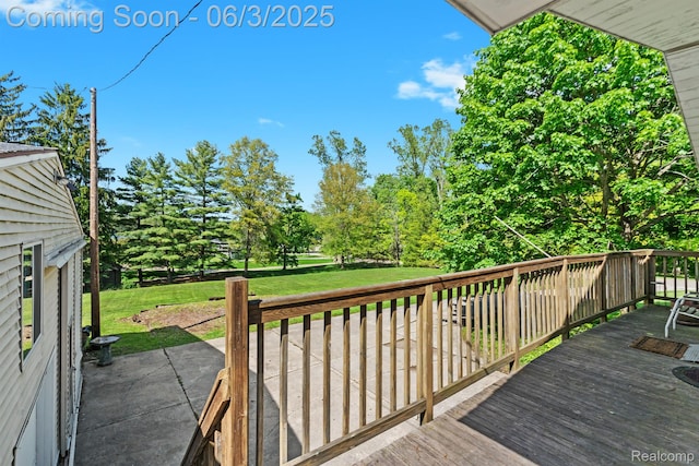 7109 Lake Shore Dr, Chelsea, MI 48118 - deck featuring a lawn