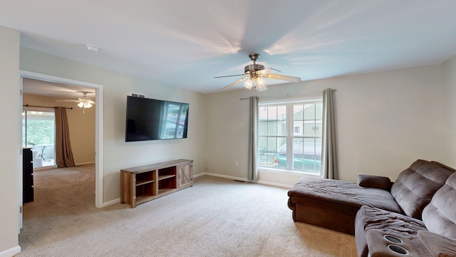 1670 Edwin Dr, Brighton, MI 48114 - living room featuring ceiling fan, carpet, and baseboards