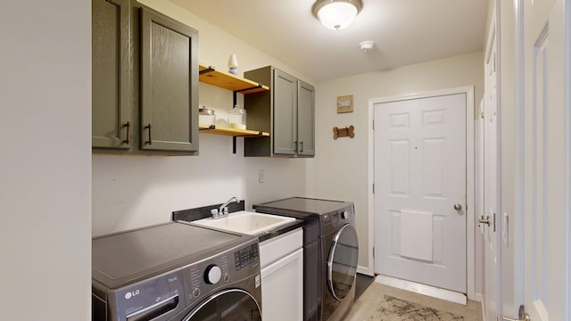 1670 Edwin Dr, Brighton, MI 48114 - laundry area featuring cabinet space and washer and dryer