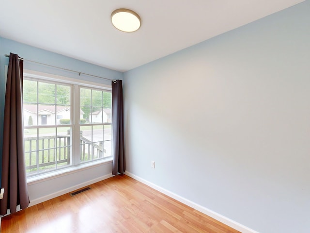 1670 Edwin Dr, Brighton, MI 48114 - unfurnished room featuring light wood-style flooring and baseboards