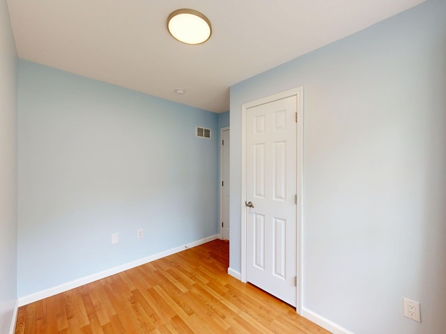 1670 Edwin Dr, Brighton, MI 48114 - unfurnished room with light wood-style floors and baseboards