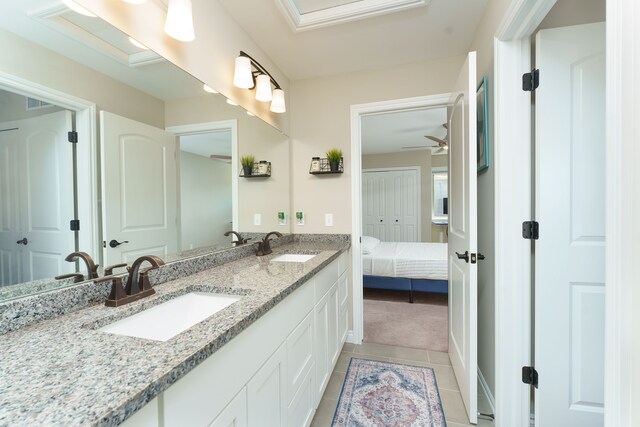10408 Stoney Point Dr, South Lyon, MI 48178 - ensuite bathroom with tile patterned flooring, double vanity, and ceiling fan