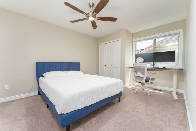 10408 Stoney Point Dr, South Lyon, MI 48178 - bedroom with carpet, a closet, baseboards, and ceiling fan