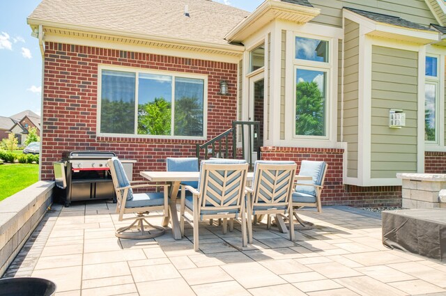 10408 Stoney Point Dr, South Lyon, MI 48178 - view of patio featuring outdoor dining space