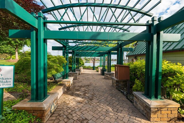 10408 Stoney Point Dr, South Lyon, MI 48178 - view of patio featuring a pergola
