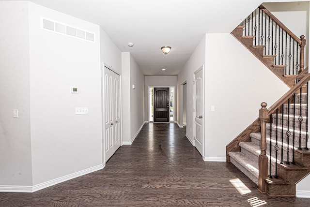 53209 Woodland Mdws, Clinton Township, MI 48047 - hall featuring wood finished floors, stairs, and baseboards