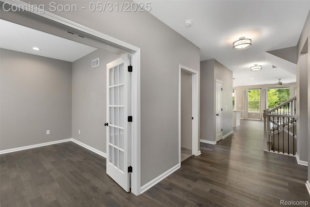 4280 Rolling Meadow Ln, Ypsilanti, MI 48197 - hall with dark wood-style floors, baseboards, an upstairs landing, and french doors