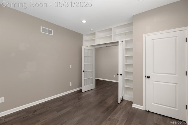 4280 Rolling Meadow Ln, Ypsilanti, MI 48197 - unfurnished bedroom with french doors, dark wood finished floors, baseboards, and recessed lighting