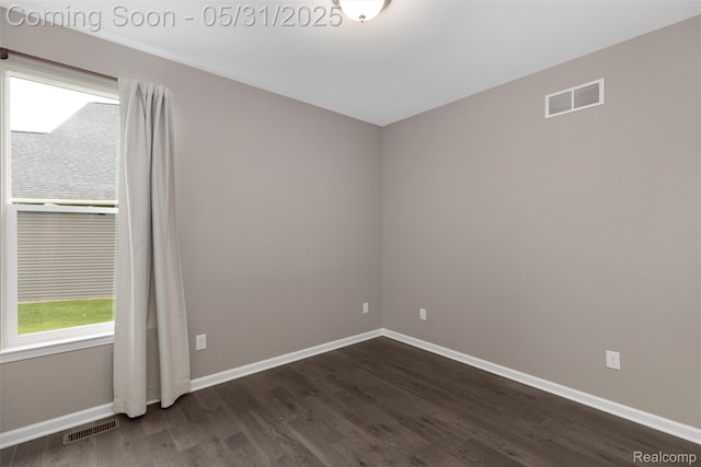 4280 Rolling Meadow Ln, Ypsilanti, MI 48197 - unfurnished room with dark wood-style flooring and baseboards