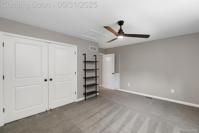 4280 Rolling Meadow Ln, Ypsilanti, MI 48197 - unfurnished bedroom with carpet flooring, baseboards, a closet, ceiling fan, and attic access