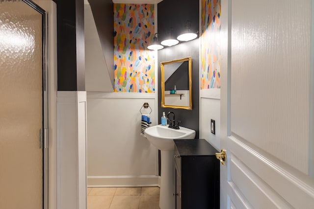 5100 Perry Rd, Grand Blanc, MI 48439 - full bathroom with tile patterned floors, a shower with shower door, and a sink