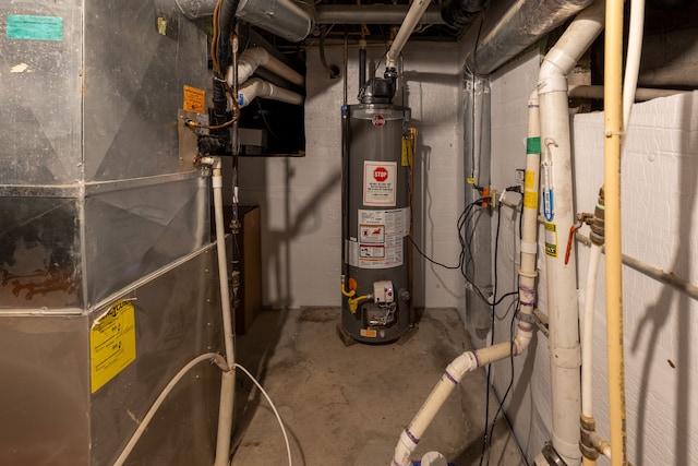 5100 Perry Rd, Grand Blanc, MI 48439 - utility room with gas water heater and heating unit