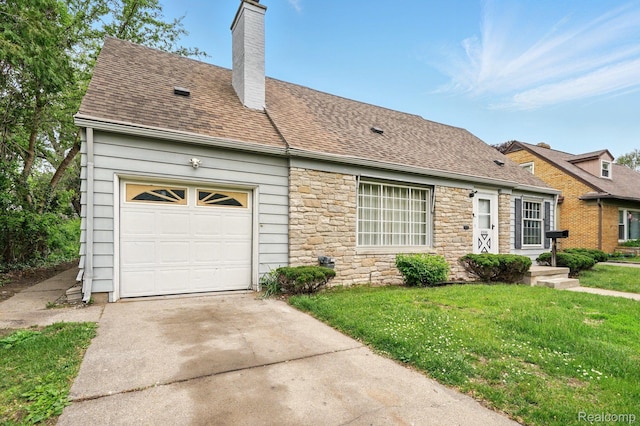2332 Nolen Dr, Flint, MI 48504 - view of front of house featuring a chimney, stone siding, concrete driveway, a garage, and a front lawn