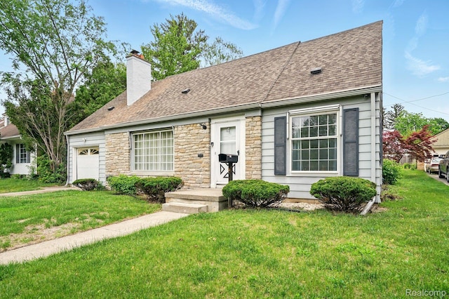 2332 Nolen Dr, Flint, MI 48504 - view of front of home with an attached garage, stone siding, and a front lawn