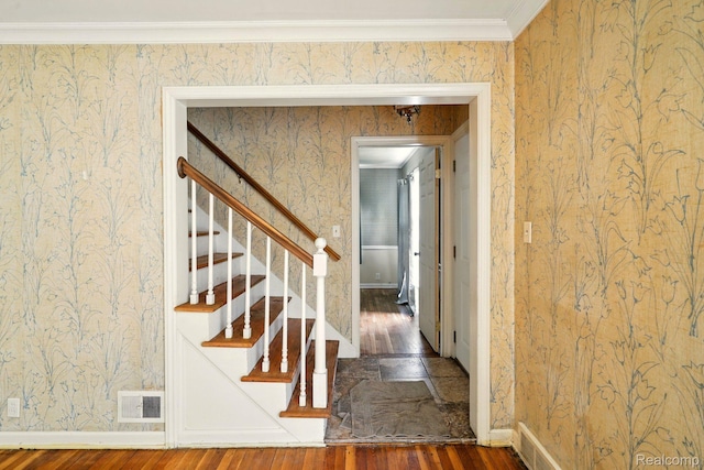 2332 Nolen Dr, Flint, MI 48504 - stairway with wood-type flooring, wallpapered walls, and ornamental molding
