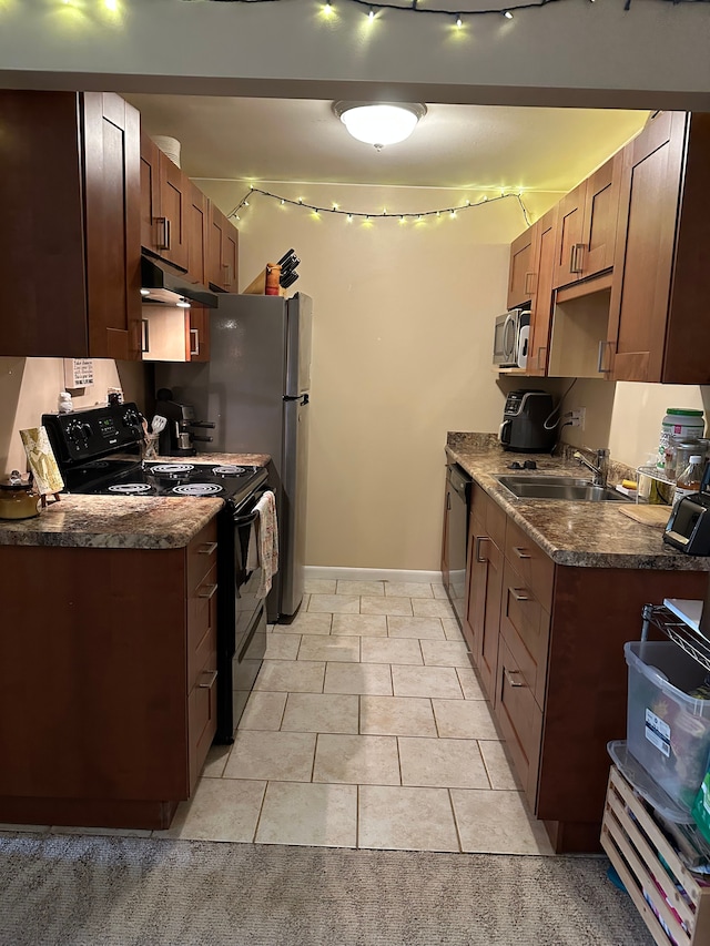 26760 Joy Rd Unit E12, Redford, MI 48239 - kitchen featuring electric range, dark countertops, stainless steel microwave, under cabinet range hood, and a sink