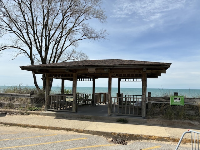 view of community with a water view