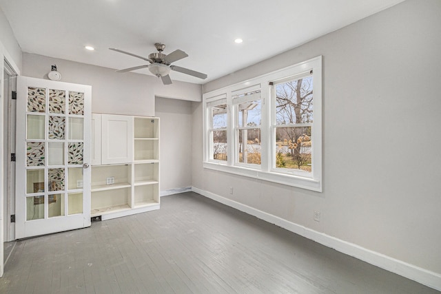4985 Lockhart St, West Bloomfield, MI 48323 - spare room with baseboards, a ceiling fan, hardwood / wood-style floors, and recessed lighting