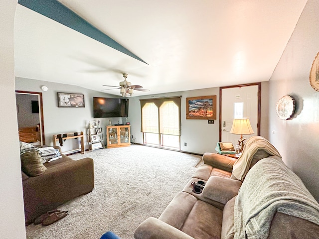 1076 N Lakeshore Rd, Harbor Beach, MI 48441 - living room featuring carpet flooring, vaulted ceiling, ceiling fan, and healthy amount of natural light