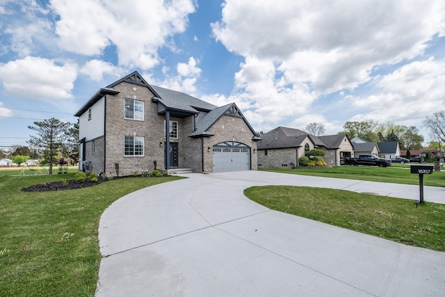 18767 Millar Rd, Clinton Township, MI 48036 - view of front of property featuring brick siding, a front yard, and driveway