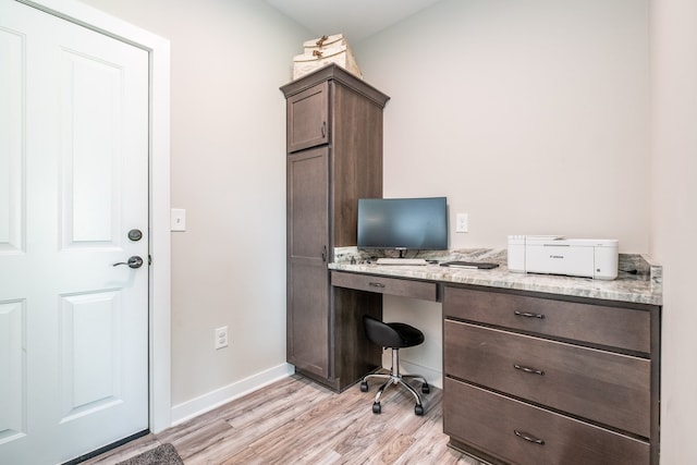 18767 Millar Rd, Clinton Township, MI 48036 - office area with light wood-type flooring, built in study area, and baseboards