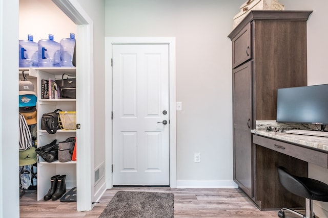 18767 Millar Rd, Clinton Township, MI 48036 - entryway with light wood-style flooring and baseboards