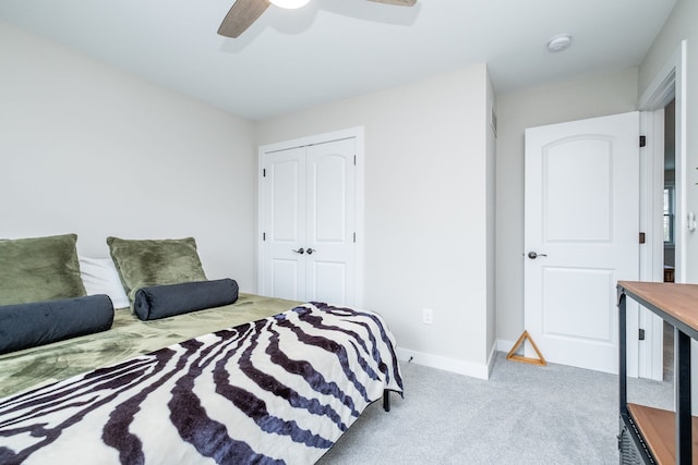 18767 Millar Rd, Clinton Township, MI 48036 - bedroom with a closet, carpet floors, baseboards, and a ceiling fan