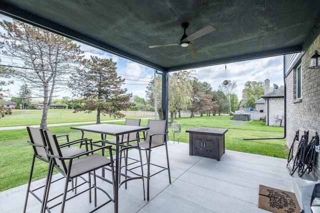 18767 Millar Rd, Clinton Township, MI 48036 - view of patio with a ceiling fan and outdoor dining area