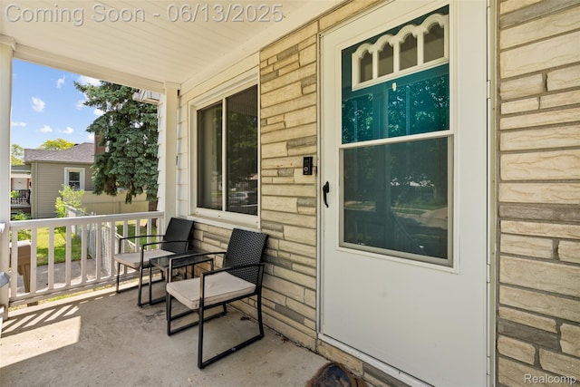 7416 Gerald Ave, Warren, MI 48092 - doorway to property with a porch