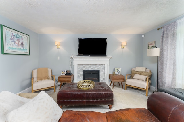 466 Wayland Ave, East Lansing, MI 48823 - living area featuring carpet floors, a tiled fireplace, and baseboards