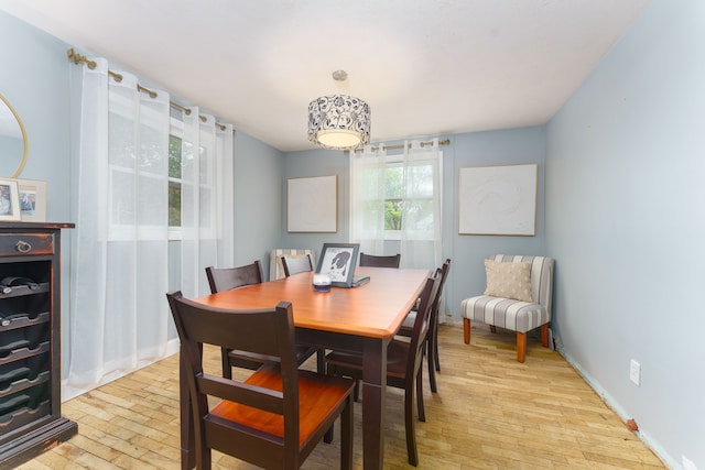 466 Wayland Ave, East Lansing, MI 48823 - dining space with light wood-type flooring and baseboards