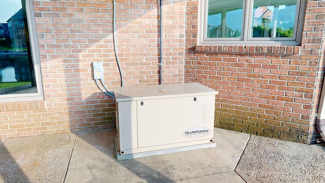 54545 Pelican Ln, Shelby Twp, MI 48315 - exterior view of a power unit and brick siding