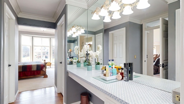 54545 Pelican Ln, Shelby Twp, MI 48315 - ensuite bathroom featuring a chandelier, wood finished floors, ornamental molding, and vanity