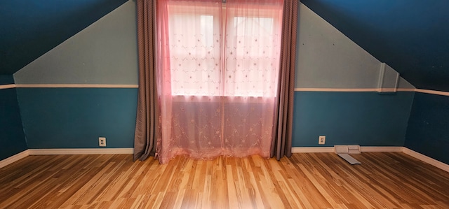 95 Mapleton Rd, Grosse Pointe Farms, MI 48236 - additional living space with plenty of natural light, wood finished floors, baseboards, and lofted ceiling