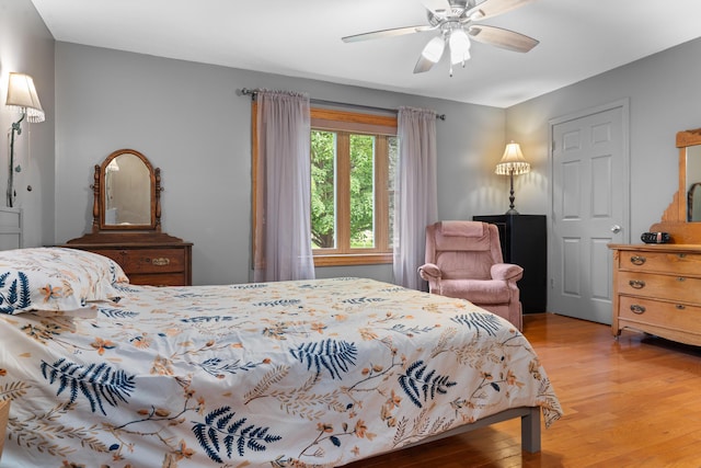 336 Jonesville Rd, Jonesville, MI 49250 - bedroom featuring light wood-type flooring and ceiling fan